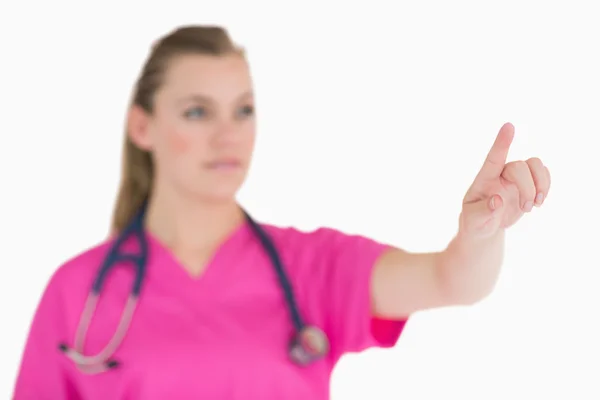 Female doctor presenting something — Stock Photo, Image