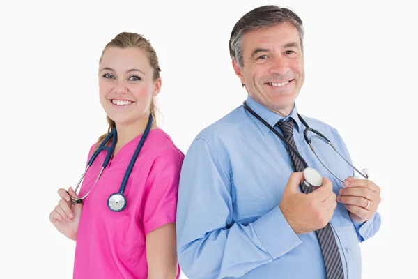 Två läkare leende — Stockfoto