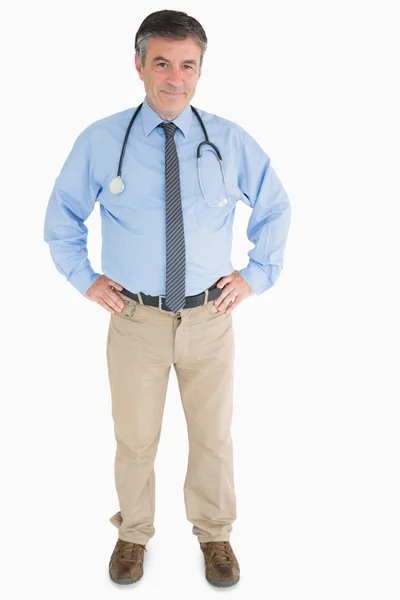 Doctor standing and smiling — Stock Photo, Image