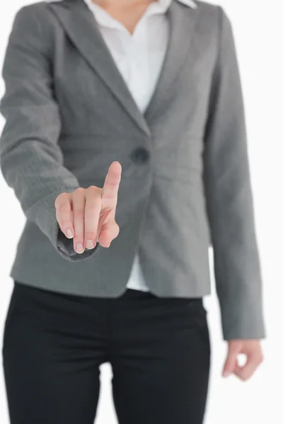 Businesswoman pointing at something — Stock Photo, Image