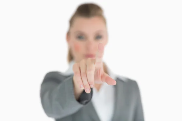 Woman pointing on something — Stock Photo, Image