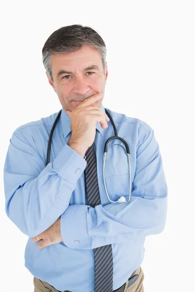 Smiling doctor is thinking — Stock Photo, Image