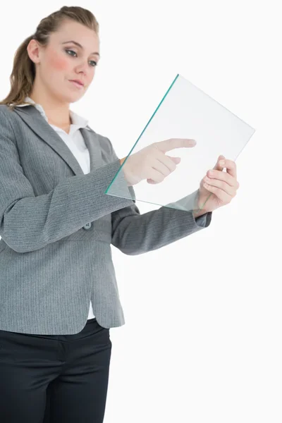 Businesswoman pointing at something on the pane — Stock Photo, Image