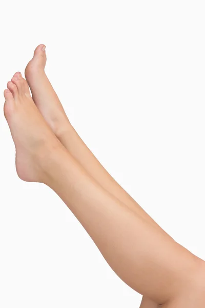 Mulher alongamento pernas — Fotografia de Stock