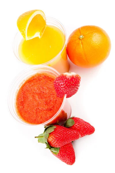 Orange and strawberry juice standing — Stock Photo, Image