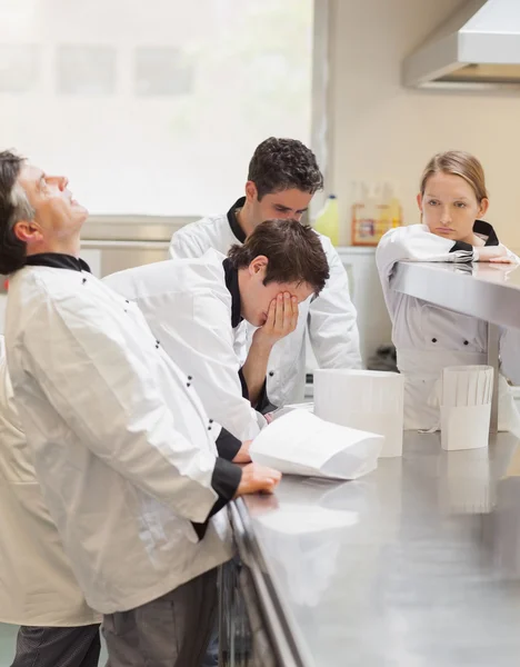 Frustrated Chef's discussing the menu — Stock Photo, Image