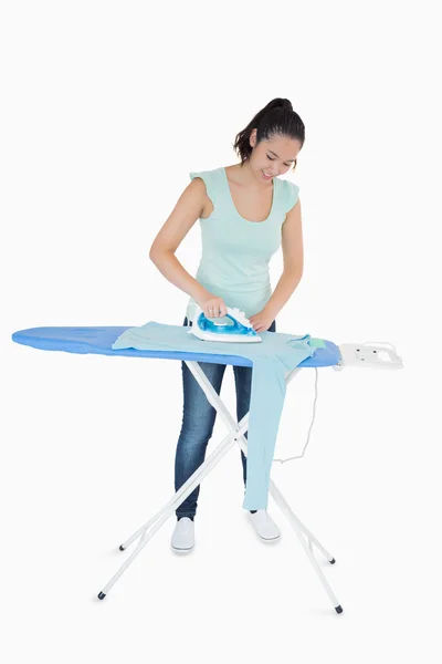 Woman ironing a jumper — Stock Photo, Image