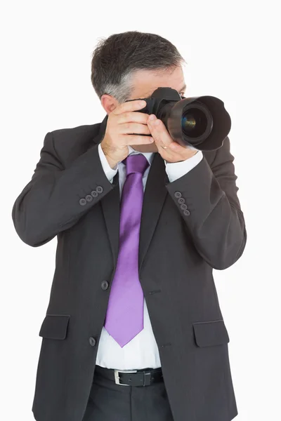 Empresário tirando uma foto — Fotografia de Stock