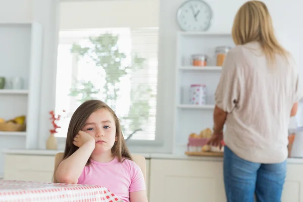 Little girl bored in the kitchen — Stock Photo, Image