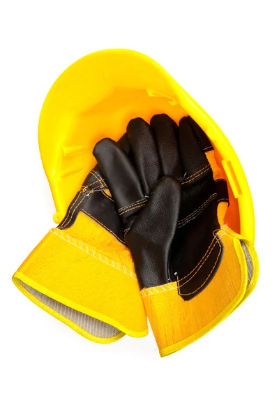 Guantes de constructor en un sombrero duro — Foto de Stock