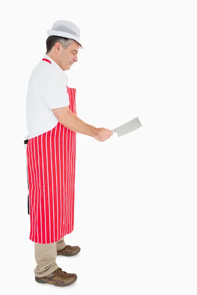 Carnicero usando cuchilla de carne —  Fotos de Stock