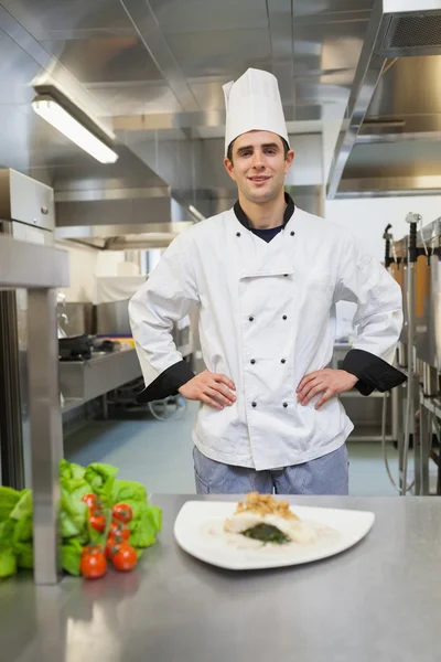 Chef standing behind his dish — Stock Photo, Image