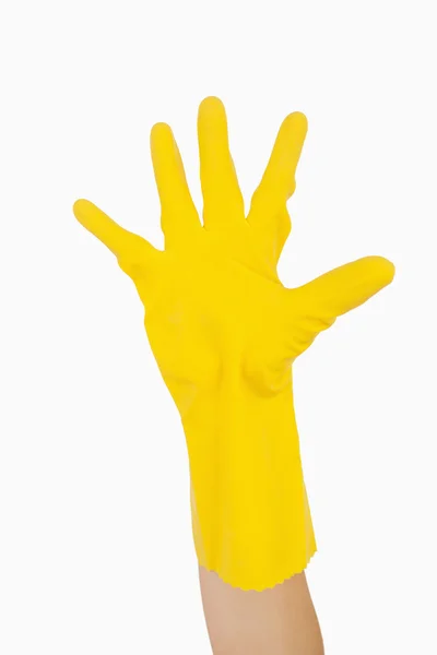 Winkende Hand im Handschuh — Stockfoto