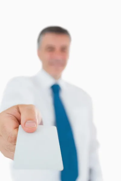 Businessman handing out card — Stock Photo, Image