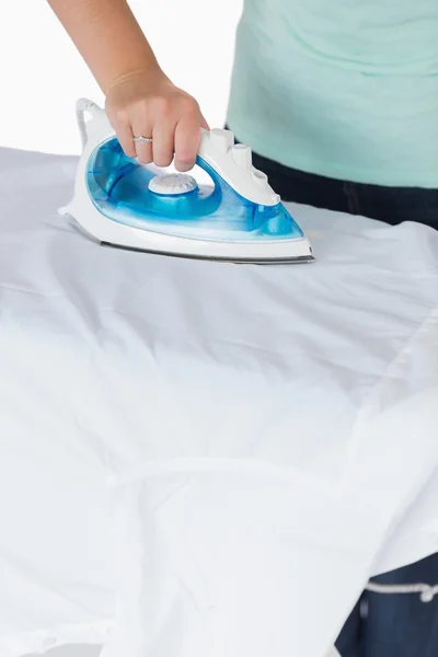 Woman ironing clothes — Stock Photo, Image