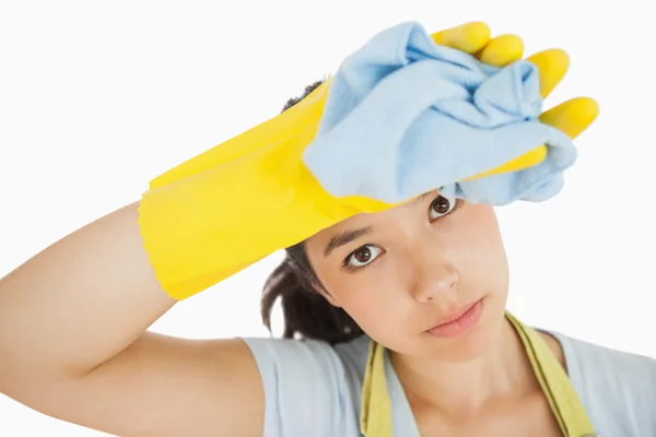 Cleaning woman wiping her brow — Stock Photo, Image