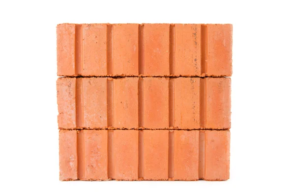 Stack of clay bricks in a wall — Stock Photo, Image