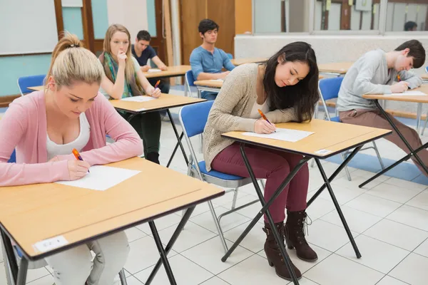 Sitting at the classroom Stock Image