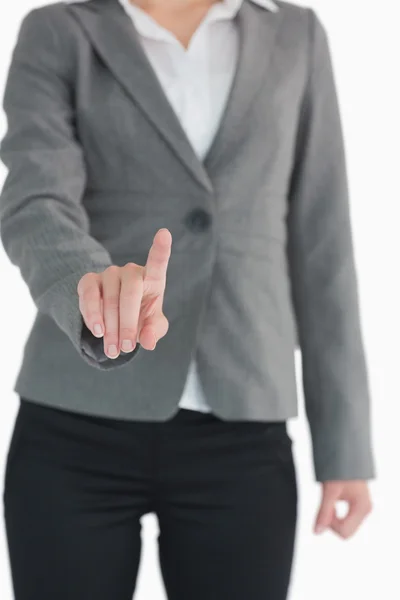 Businesswoman pointing at something Royalty Free Stock Photos
