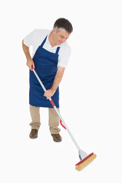 Man mopping the floor — Stock Photo, Image