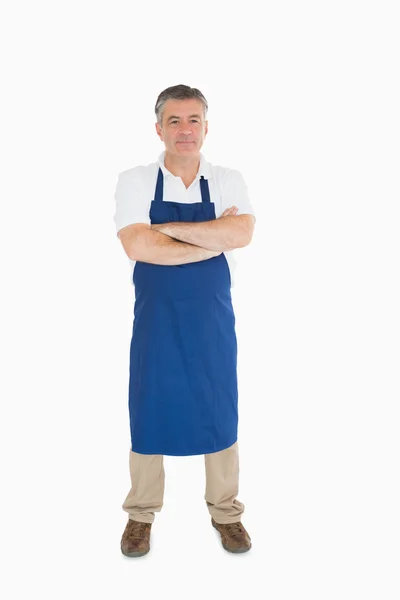 Man standing in apron — Stock Photo, Image