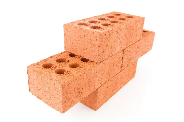Four red bricks stacked as a part of a wall — Stock Photo, Image