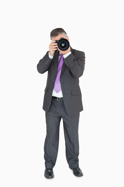 Man met camera — Stockfoto