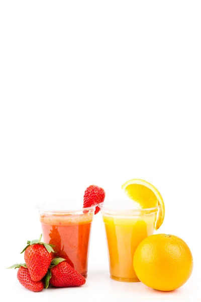 Bebidas de morango e laranja — Fotografia de Stock