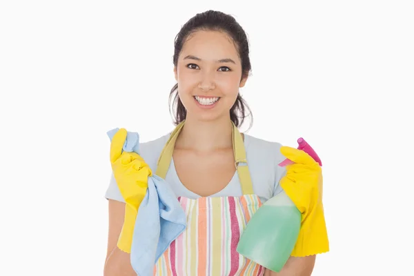 Woman holding cloth and spray bottle — Stock Photo, Image