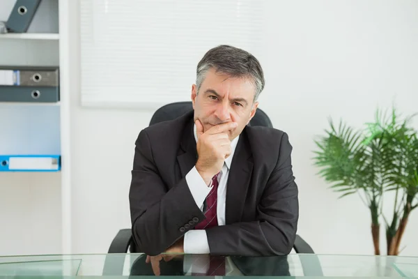 Businessman looking thoughtfully — Stock Photo, Image