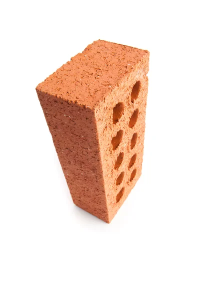 Standing red brick with ten holes — Stock Photo, Image