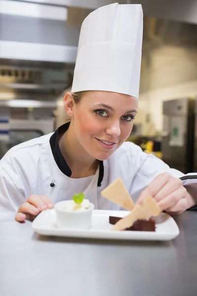 Happy chef finishing desert — Stock Photo, Image