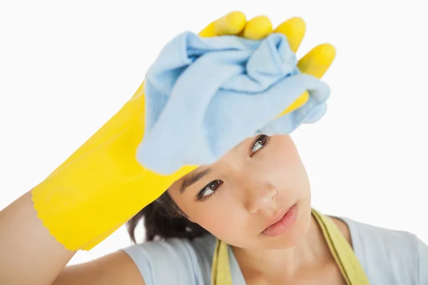 Overworked cleaning lady wiping her brow — Stock Photo, Image