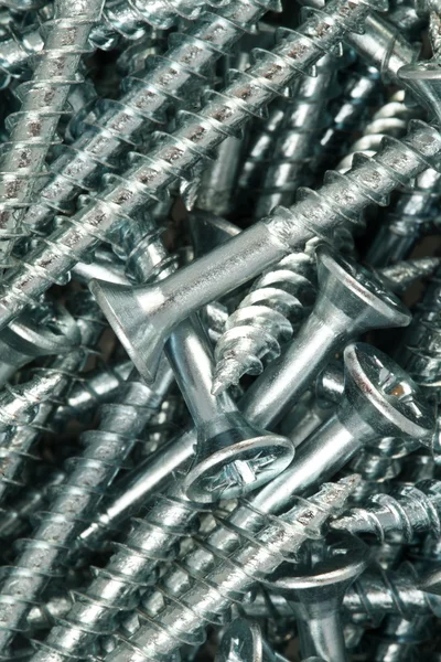 Many silver screws — Stock Photo, Image