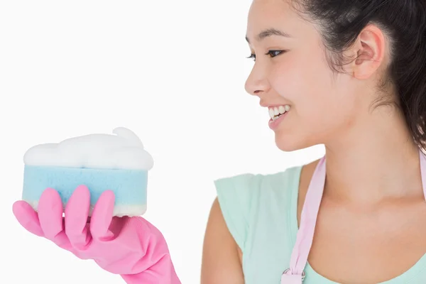 Woman with a sponge — Stock Photo, Image
