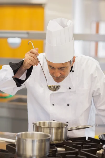 Chef about to taste soup — Stock Photo, Image