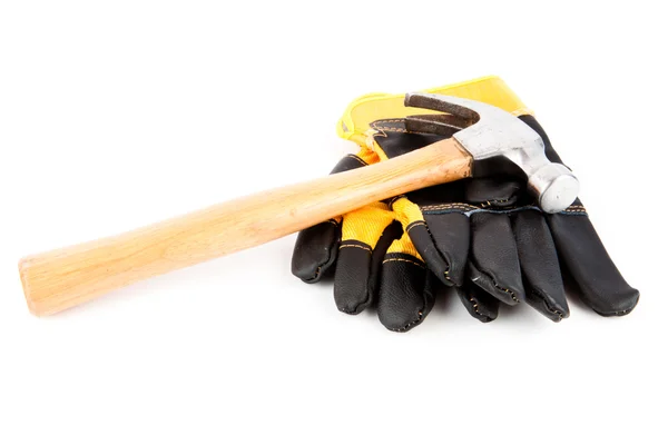Защитные перчатки и молоток — стоковое фото