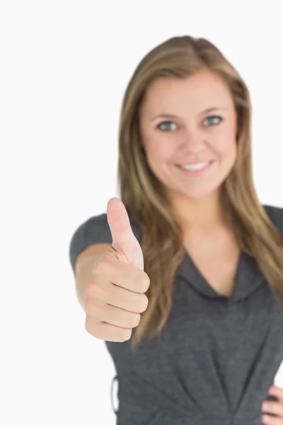 Woman giving thumbs up — Stock Photo, Image