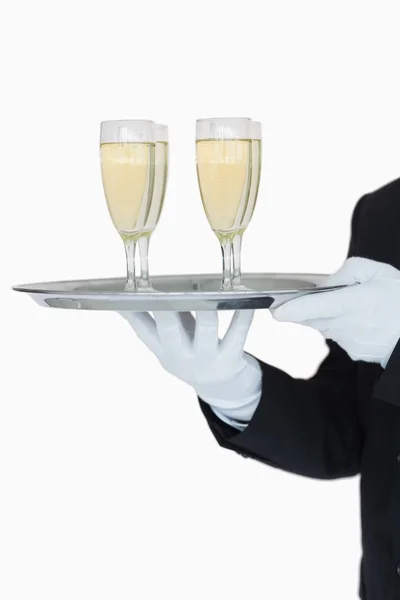 Kelner Trzymając zasobnik flety szampana — Zdjęcie stockowe