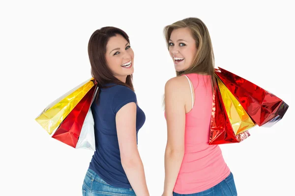 Dwie kobiety szczęśliwy z torbą na zakupy — Zdjęcie stockowe