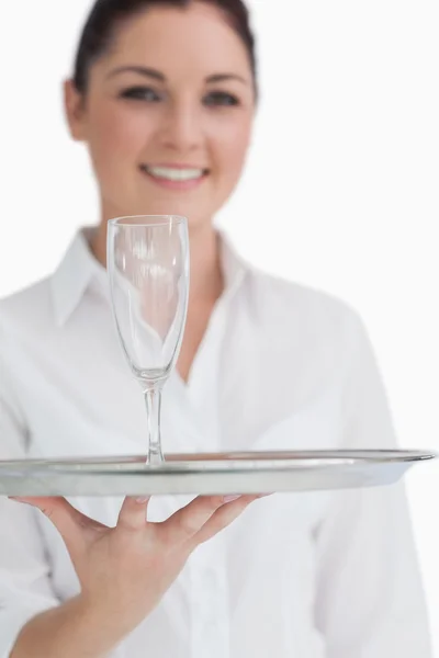 Close up of glass on tray — Stock Photo, Image