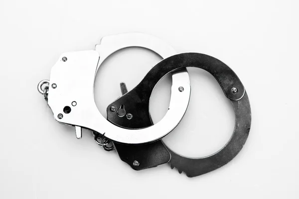 Black and silver handcuffs — Stockfoto
