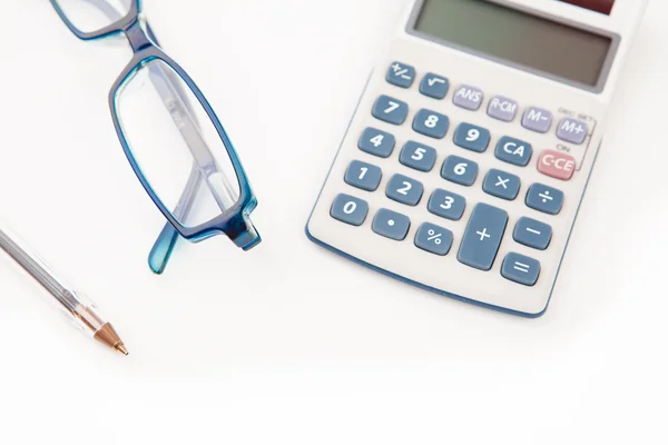 Pen calculator and glasses — Stock Photo, Image