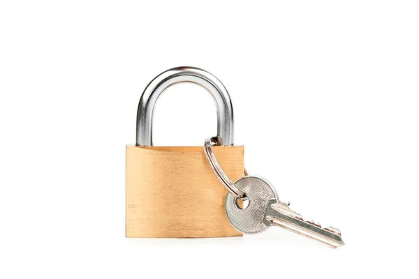 Padlock standing with key hanging — Stock Photo, Image