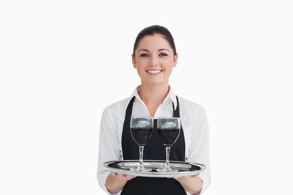 Waitress holding wine — Stock Photo, Image