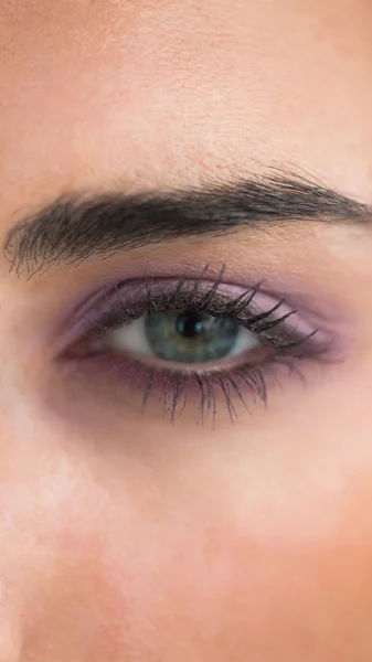 Woman wearing purple eye shadow — Stock Photo, Image