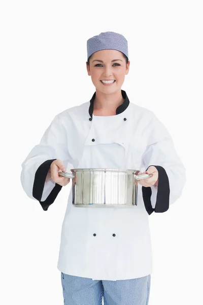 Cook holding a pot — Stock Photo, Image