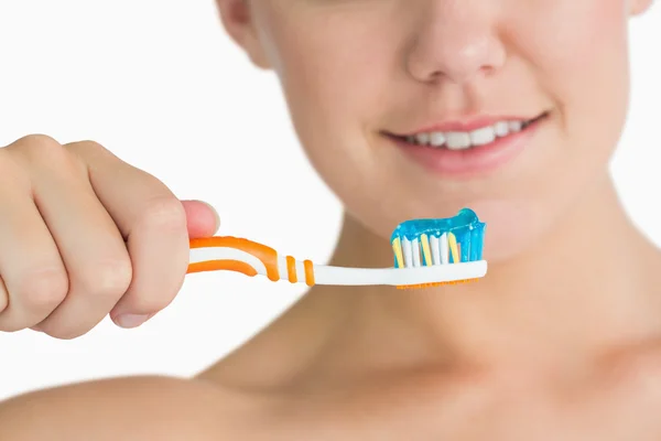 Vrouw met de tandenborstel — Stockfoto