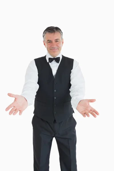Waiter with open arms — Stock Photo, Image