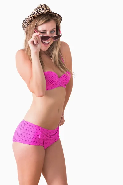 Woman wearing underwear and winking — Stock Photo, Image